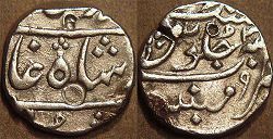 Silver half rupee with the name of Muhammad Shah (1719-1748), Munbai, regnal year 31